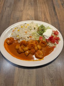 Shrimp in sauce with rice platter