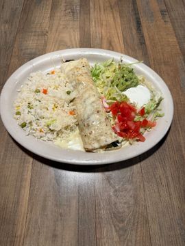 Mexican dish with sides on a plate
