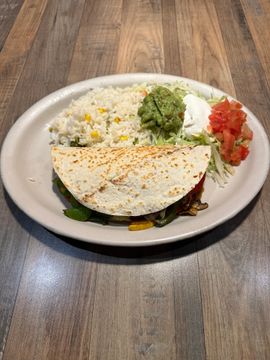 Quesadilla served with guacamole and salsa