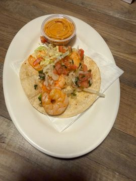 Fresh shrimp taco with salsa topping