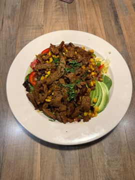 Seasoned beef with corn, peppers, avocado