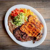 Grilled steak and chicken with sides