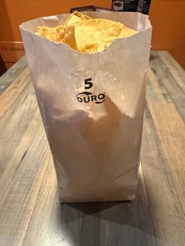 Paper bag filled with chips