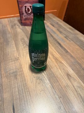 Maison Perrier bottle standing upright