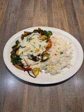 Grilled vegetables and rice on plate