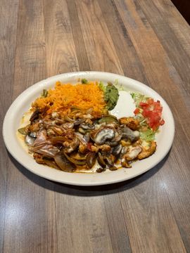 Plate of grilled mushrooms and rice