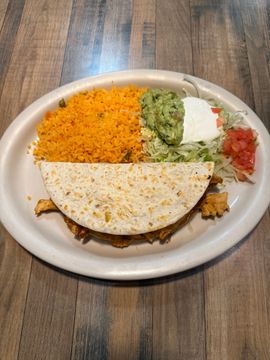 Mexican meal with rice and toppings