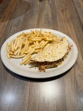 Taco served with French fries