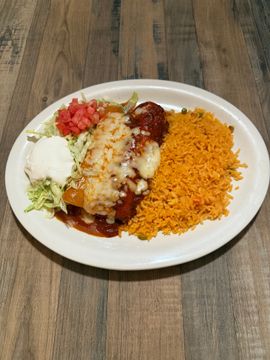 Plate of enchiladas with yellow rice