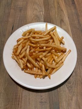 Plate of crispy French fries