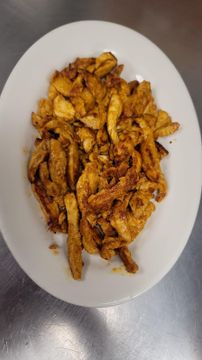Spiced chicken pieces served on platter