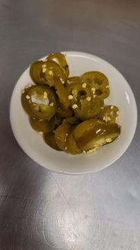 Spicy jalapeño slices on a plate