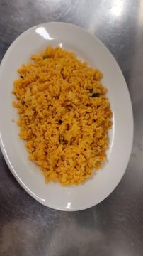 Fluffy yellow rice serving