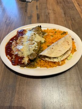 Plate of Mexican food with cheese topping