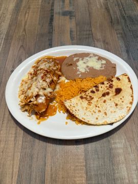 Plate of enchilada, rice, beans, tortilla