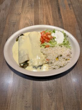 Cheesy enchiladas with rice and salad