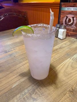 Refreshing beverage on wooden table