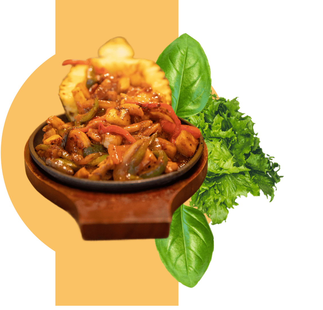 Skillet of sizzling mixed vegetable fajitas